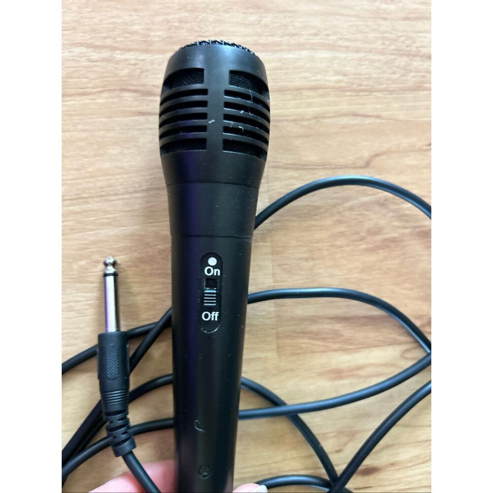 Mic from karaoke machine and a cd party tyme karaoke